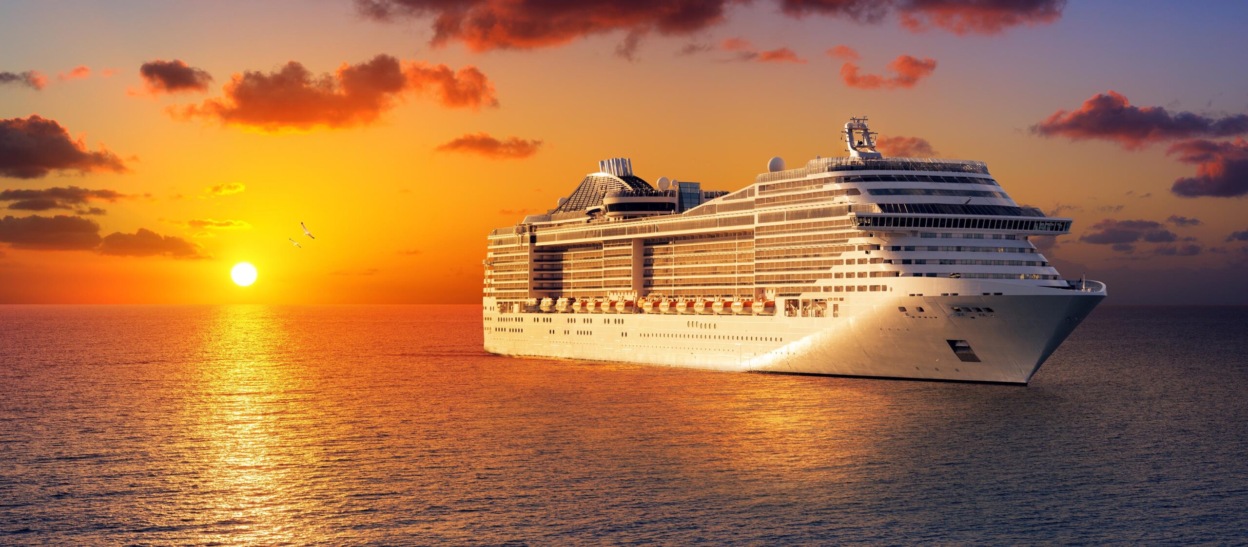 Cruise liner at sunset